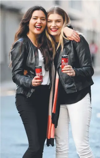  ??  ?? Zoe O'Sullivan and Clare O'Brien enjoy the new 'no sugar' Coca Cola.