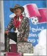  ??  ?? A football buff at 24th Arabian Gulf Cup’s action on Monday.