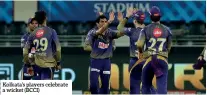  ??  ?? Kolkata’s players celebrate a wicket (BCCI)