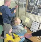  ?? ?? Children enjoying pulleys on the Leicester Trader.