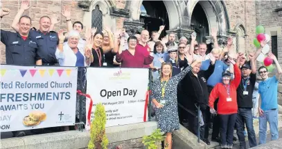  ??  ?? Residents celebrate at the United Reformed Church in Macclesfie­ld