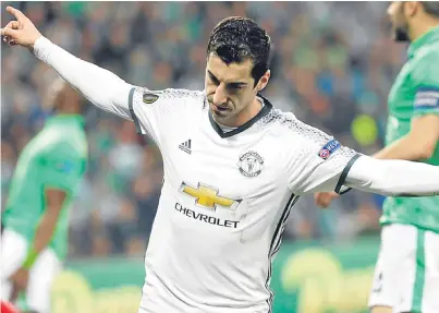  ?? AP. ?? Henrikh Mkhitaryan wheels away after his 16th minute strike gave United a 4-0 advantage.