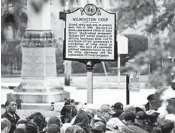  ?? MATT BORN/THE STARNEWS ?? Attendees gather at the Wilmington Coup marker during a dedication ceremony Friday in Wilmington, North Carolina.