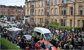  ??  ?? Protesters block the immigratio­n enforcemen­t van on Kenmure Street in Glasgow. Photograph: Jeff J Mitchell/Getty Images