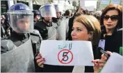  ??  ?? ANADOLU AGENCY/GETTY IMAGES Algerian lawyers stage a protest march in the capital against Abdelaziz Bouteflika standing for a fifth term.