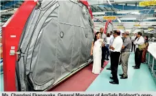  ??  ?? Ms. Chandani Ekanayake, General Manager of AmSafe Bridport’s operations in Sri Lanka, explaining to visitors the new factory.