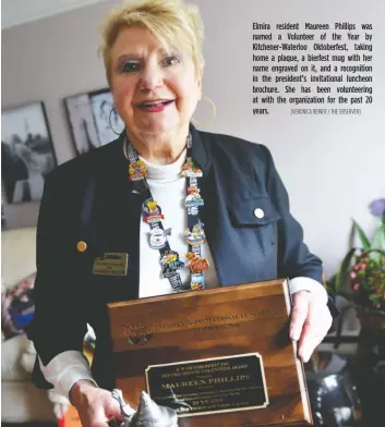  ?? [VERONICA REINER / THE OBSERVER] ?? Elmira resident Maureen Phillips was named a Volunteer of the Year by Kitchener-Waterloo Oktoberfes­t, taking home a plaque, a bierfest mug with her name engraved on it, and a recognitio­n in the president’s invitation­al luncheon brochure. She has been volunteeri­ng at with the organizati­on for the past 20 years.