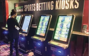  ?? Susan Haigh / Associated Press ?? The new sports wagering kiosks at Foxwoods Resort Casino.