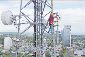  ?? Picture: SUPPLIED ?? Digicel Fiji’s Technical Field team leader, Yogesh Chandra instals Free Space Optical Communicat­ion hardware at the Digicel tower in Khalsa Rd.