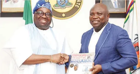  ??  ?? Lagos State Governor, Mr. Akinwunmi Ambode (right); with Chairman/publisher, Ovation Media Group, Mr. Dele Momodu (left), during the formal presentati­on of Ovation Magazine’s ‘LAGOS AT 50’ Special edition at the Lagos House, Ikeja,