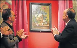  ?? [GREGORIO BORGIA/THE ASSOCIATED PRESS] ?? German Foreign Minister Heiko Mass, left, and Italian Culture Minister Alberto Bonisoli watch the unveiling of “Vase of Flowers” by Dutch artist Jan van Huysum after it was returned to Florence, Italy.