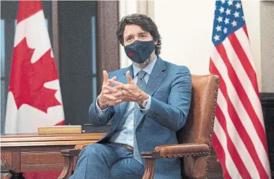  ?? ADRIAN WYLD THE CANADIAN PRESS ?? Who, me? Prime Minister Justin Trudeau has been found wanting in failing to ensure a ready supply of the vaccine for Canada, letter-writer Allan Waxman says. How long do we have to wait? he asks.