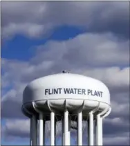  ?? THE ASSOCIATED PRESS ?? The Flint Water Plant water tower is seen in Flint, Mich. The inspector general for the Environmen­tal Protection Agency says the agency had authority and sufficient informatio­n to issue an emergency order to protect residents of Flint, Michigan, from...