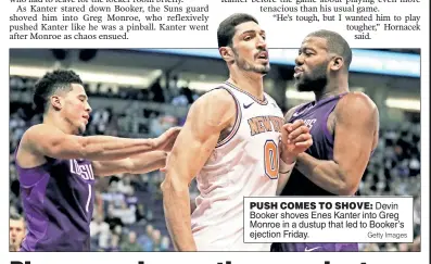  ?? Getty Images ?? PUSH COMES TO SHOVE: Devin Booker shoves Enes Kanter into Greg Monroe in a dustup that led to Booker’s ejection Friday.