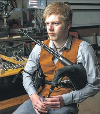  ?? HIE) ?? Scott Burgess Hay playing a set of small bellows pipes which he made(Photograph