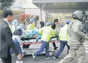  ?? EPA-EFE/ YONHAP ?? A North Korean soldier is rushed into a hospital in South Korea after being shot as he defected across the border on Monday.