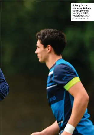  ?? RAMSEY CARDY/SPORTSFILE ?? Johnny Sexton and Joey Carbery warm up during training in UCD yesterday