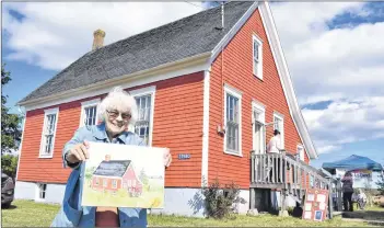  ?? DESIREE ANSTEY/ JOURNAL PIONEER ?? West Prince Arts Council member Nan Ferrier, from Tyne Valley, painted the old schoolhous­e red before it was given a new facelift. Ferrier is one of the longest serving members in the group.