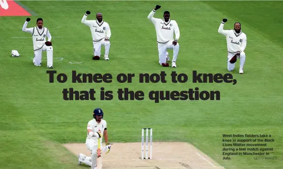  ?? GETTY IMAGES ?? West Indies fielders take a knee in support of the Black Lives Matter movement during a test match against England in Manchester in July.