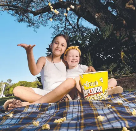  ??  ?? Indie O'keefe, 8, and Harper Broodbank, 4, are set to watch Secrets of Pets 2 at Riverway. Picture: Evan Morgan