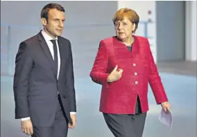  ??  ?? Angela Merkel mostró su determinac­ión de revitaliza­r el eje franco-alemán para lograr una UE más efectiva y protectora.