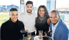  ?? Picture: MEYER SALVELIO ?? FINE VIEW: Guests, from left, Charl Alexander, Nelson Mandela Bay Yacht Club general manager Ruben Rosales, Isabel Khowa and Vuyo Tutu attended the launch of the club in the Port Elizabeth Harbour last Thursday