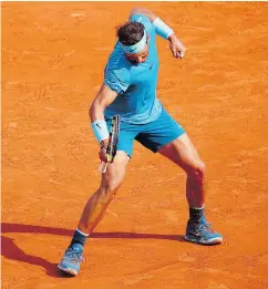  ?? CHRISTOPHE ENA / THE ASSOCIATED PRESS ?? Rafael Nadal clinches his semifinal in straight sets over Juan Martin del Potro at the French Open in Paris Friday.