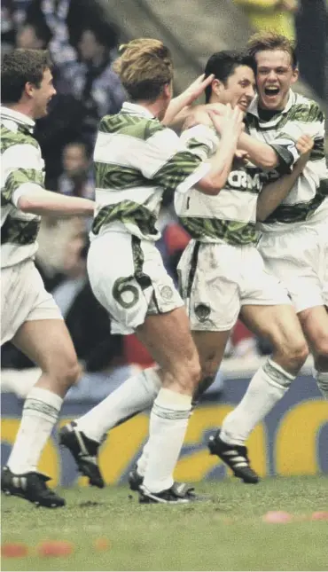  ??  ?? 0 Celtic’s John Collins (second from the right) celebrates his April 1994 derby goal at Ibrox.