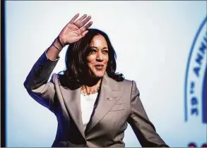  ?? Ashlee Rezin / Associated Press ?? Vice President Kamala Harris waves to attendees as she walks on stage to speak at the National Associatio­n of Latino Elected and Appointed Officials 39th Annual Conference at Swissôtel Chicago in downtown Chicago on Friday.