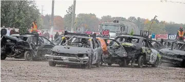  ?? PHOTOS: BERND FRANKE TORSTAR ?? A demolition derby for compacts Saturday at Merrittvil­le Speedway in Thorold was a crash course for collisions.