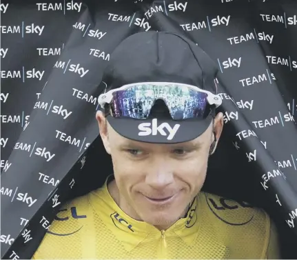  ??  ?? 2 Chris Froome, wearing the overall leader’s yellow jersey at the 2017 Tour de France, leads a strong Team Sky lineup for this year’s edition of the race, which starts on Saturday.