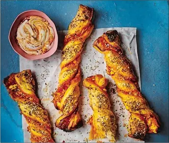 ?? CRAIG ROBERTSON ?? Preserved lemon, feta and za’atar twists from the “Taste & Flavour” cookbook, which is a collection of recipes for people who have lost their taste and smell due to COVID-19.