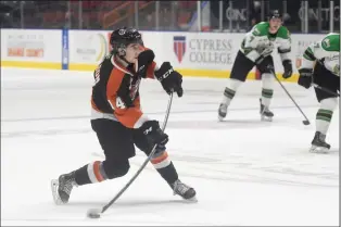  ?? NEWS PHOTO JAMES TUBB ?? Medicine Hat Tigers forward Noah Danielson fires a shot on net in the first period of the his team’s Western Hockey League game against the Prince Albert Raiders on Friday night at Co-op Place.