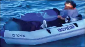  ?? ?? Drifting: The suspect in the 7ft dinghy he was using to reach France