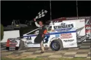 ?? RICK KEPNER — FOR DIGITAL FIRST MEDIA ?? Brad Grim celebrates in victory lane after his win on July 8 at Grandview.