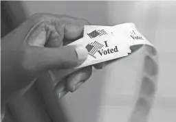  ?? PATRICK SEMANSKY/AP ?? For most cities, primary elections will be held n Aug. 28, with runoff elections in November if necessary.