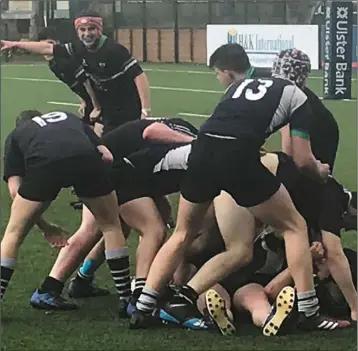  ??  ?? Dundalk/Ardee pile pressure on the DLSP defence.