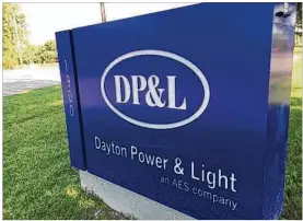  ?? THOMAS GNAU / STAFF ?? Dayton Power & Light’s owner has said it will cut 160 jobs in Ohio — including an untold number in Dayton — and Indiana.