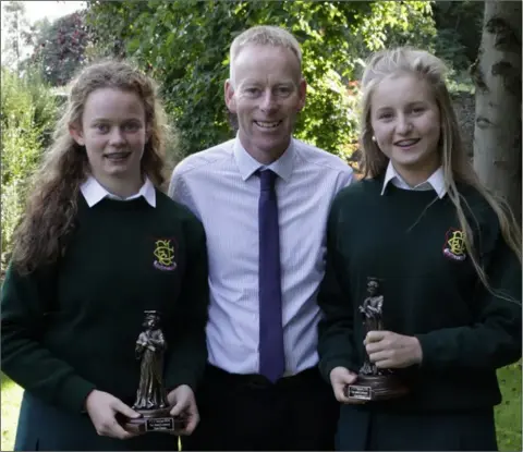  ??  ?? Winners of the Junior Cert Awards Ciara Carroll and Ciara Kinsella with Deputy Principal Mr Daly