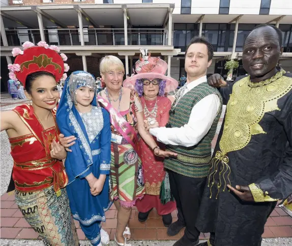  ?? Picture: ALAN BARBER ?? OH, THE HUMANITY: Showcasing Geelong's diversity at yesterday’s Humans in Geelong event are Susan Howes, Manizha Mirandi, event founder Jacqui Bennett, Dame Edna Average, Alex Tigan and Thalual Marwang.