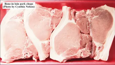  ?? ?? Bone-in loin pork chops (Photo by Cynthia Nelson)