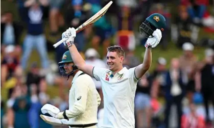  ?? Photograph: Kerry Marshall/AP ?? Australia's Cameron Green celebrates reaching his century on the first day of Test match against New Zealand in Wellington.