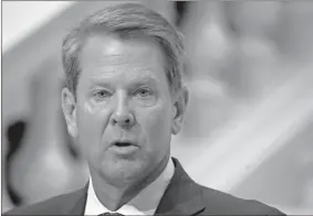  ?? AP-John Bazemore, File ?? Georgia Gov. Brian Kemp Monday signed a 15-day extension of an order mandating requiremen­ts on social distancing and bans gatherings of more than 50 people.