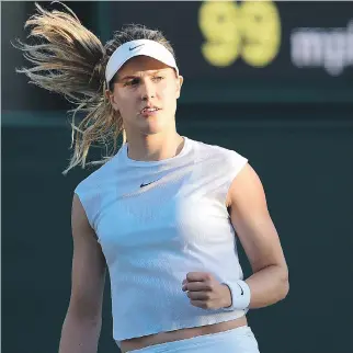  ?? OLI SCARFF/AFP/GETTY IMAGES ?? Canada’s Eugenie Bouchard made an early exit at Wimbledon on Monday after dropping a 1-6, 6-1, 6-1 decision to Spain’s Carla Suarez Navarro in first-round play.