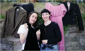  ?? Photograph­s: Lisa Maree Williams/The Guardian ?? Olivia Solomon, 13, buys a dress from Jessica Taylor at her Darlinghur­st garage sale stall in Sydney on Sunday.