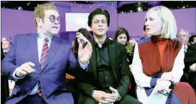  ?? Picture: REUTERS ?? BENEVOLENT: Singer Elton John, actor Shah Rukh Khan and actress Cate Blanchett converse at the Crystal Awards ceremony of the annual meeting of the World Economic Forum in Davos, Switzerlan­d.