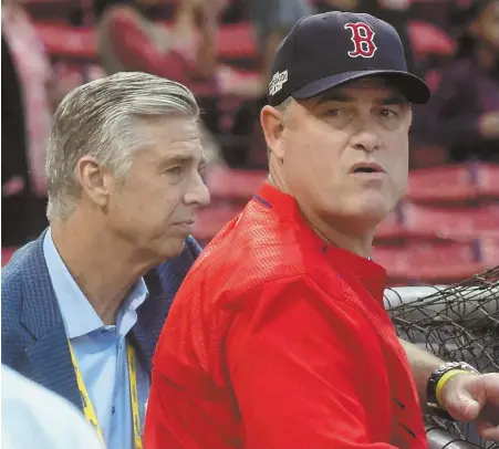  ?? HERALD PHOTO BY JIM MICHAUD ?? SPLITTERS: Dave Dombrowski announced yesterday that manager John Farrell won’t be back.