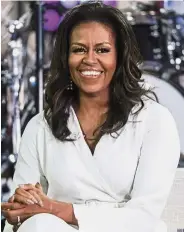  ??  ?? In her words: In her book ‘Becoming’, Obama denounces the president for bragging to a TV host in 2005 about sexually assaulting women.