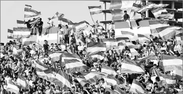  ??  ?? Kurds celebrate to show their support for the upcoming independen­ce referendum in Erbil, Iraq. — Reuters photo