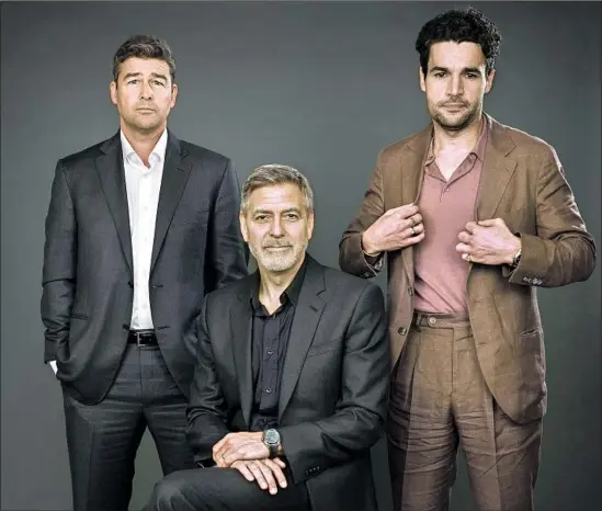  ?? Michael Nagle For The Times ?? KYLE CHANDLER, left, George Clooney and Chris Abbott star in the Hulu miniseries “Catch 22,” which points up the absurdity of war in a bitingly satirical tone.